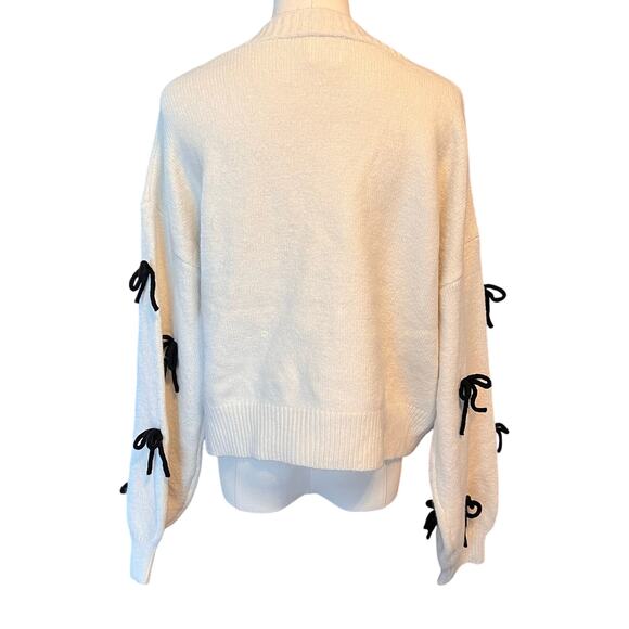 LUNA IVY Ivory With Black Bows V-Neck Button Cardigan Anthropologie. Size Large - Picture 3 of 8